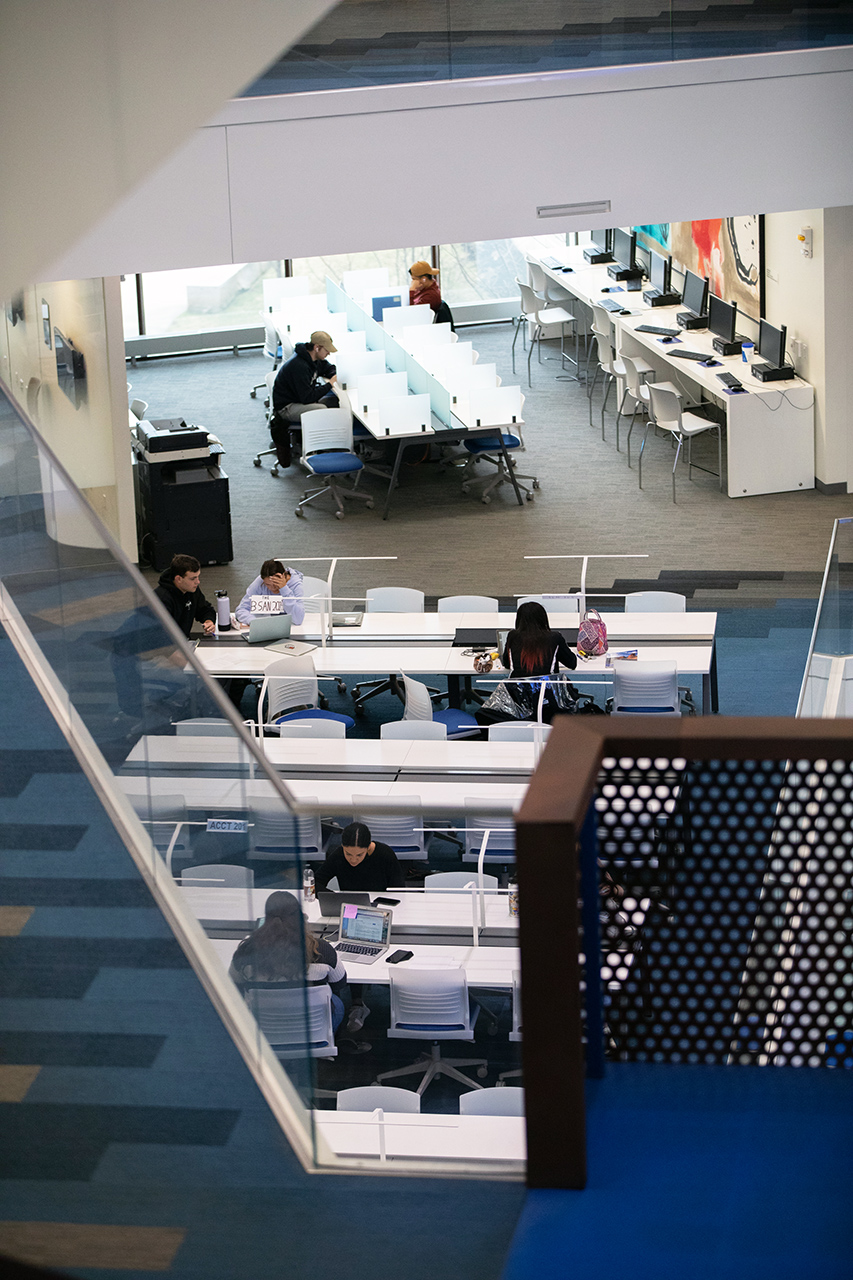 Students work at the TA area on the second floor of Capitol Federal Hall