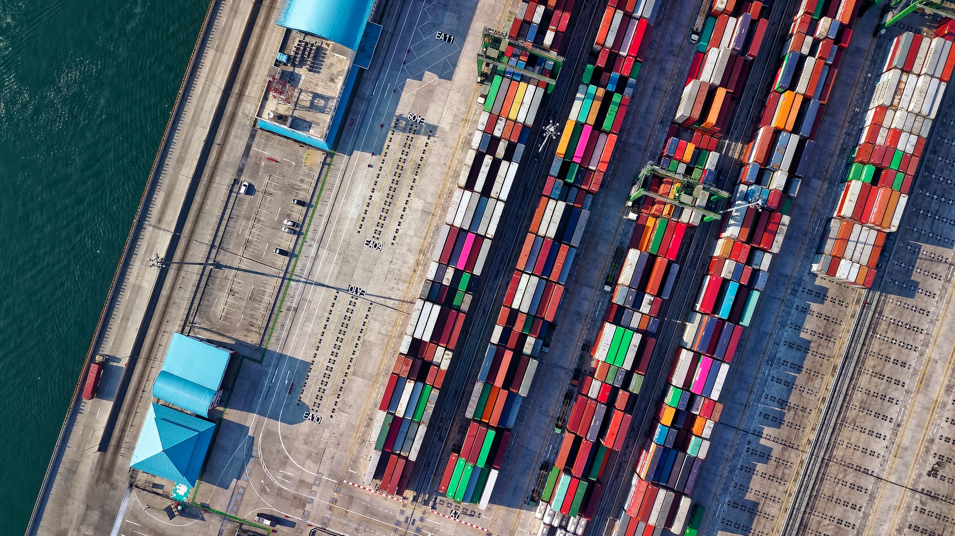 An overhead view of shipping containers on a barge